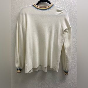 NWOT, white thin sweater with rainbow around neck and sleeves.